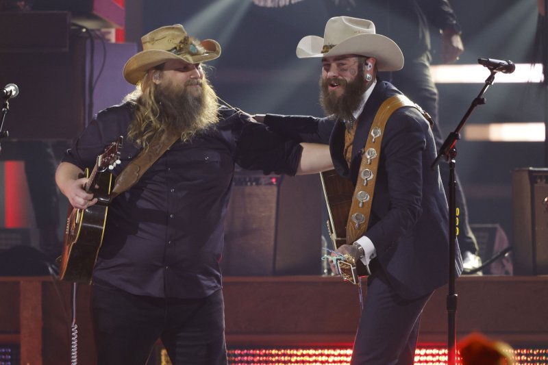 Post Malone and Chris Stapleton open the 2024 CMA Awards with a performance of their song "California Sober" in Nashville on Wednesday. Photo by John Angelillo/UPI