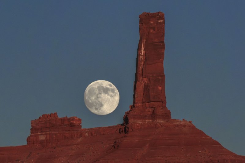 The moon rises over Castleton Tower near Moab, Utah, on Thursday, November 14, 2024. The next super moon will occur in October 2025. Photo by Bob Strong/UPI