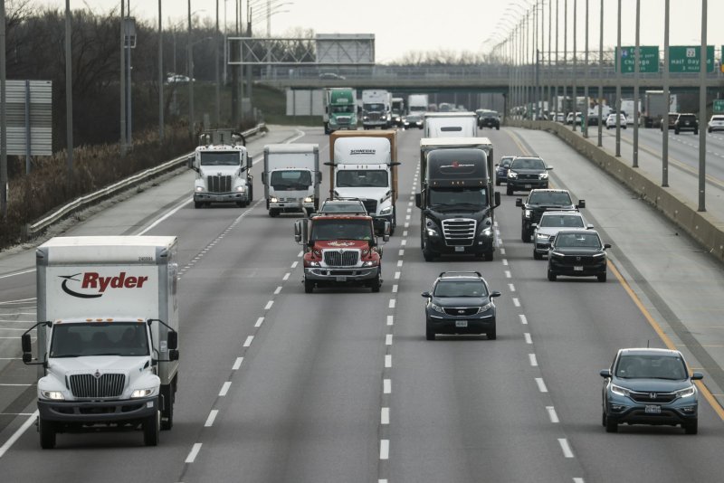 Traffic moves along Interstate 294 the day before the Thanksgiving holiday in Highland Park, Ill., on Wednesday. Photo by Tannen Maury/UPI