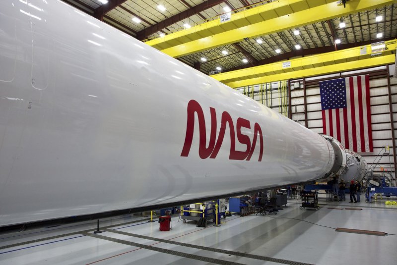 An updated SpaceX Falcon 9 rocket is seen before a flight to the International Space Station for NASA. NASA announced that SpaceX will launch its Dragonfly mission to Saturn's moon Titan. File Photo by SpaceX/UPI