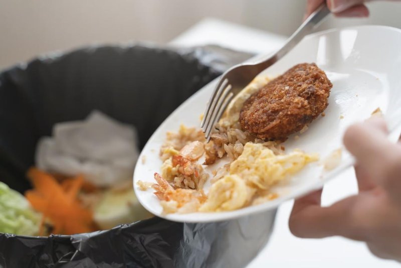 America's kitchen trash bins are receiving more unwanted food as appetites falter among people taking GLP-1 weight-loss meds, a new study shows. Photo by Adobe Stock/HealthDay News