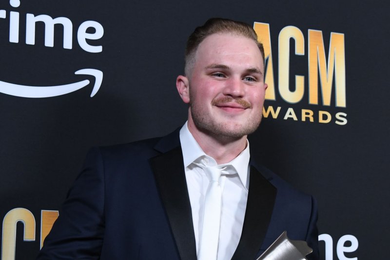 Zach Bryan shows off his New Male Artist of the Year Award at the Academy of Country Music Awards in 2023. He is a Top Artist contender at the Billboard Music Awards. File Photo by Ian Halperin/UPI